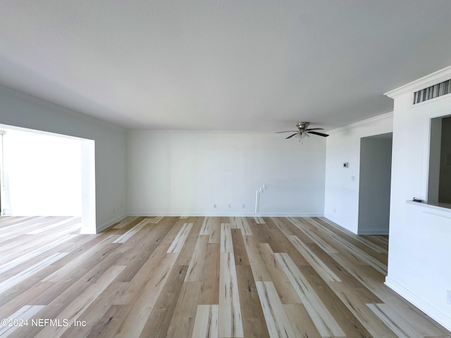 unfurnished living room featuring light hardwood / wood-style floors and ceiling fan