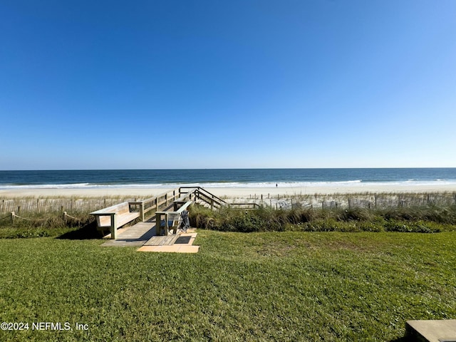 property view of water featuring a beach view