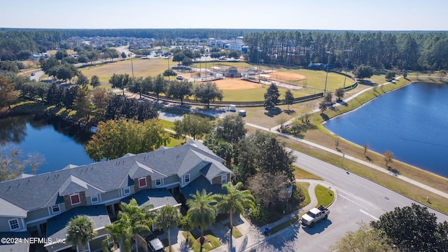 birds eye view of property featuring a water view