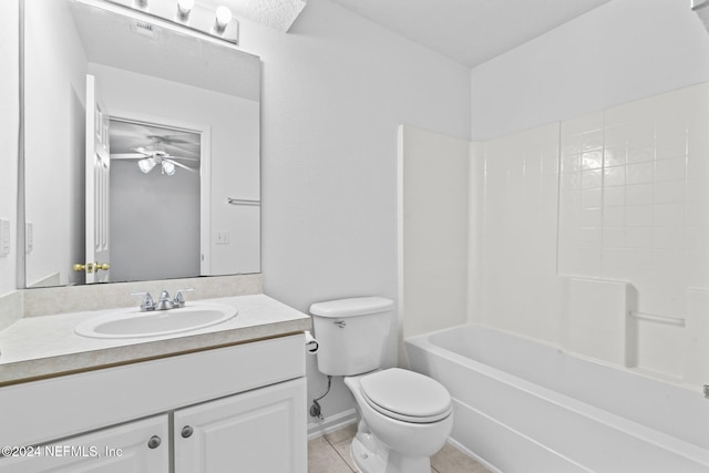 full bathroom with ceiling fan, tile patterned floors,  shower combination, toilet, and vanity