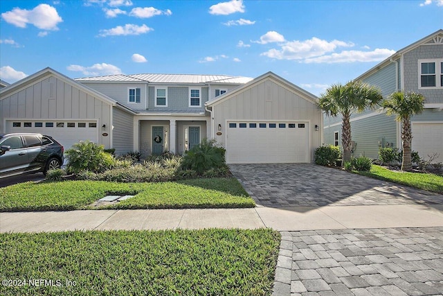 view of front of property featuring a garage