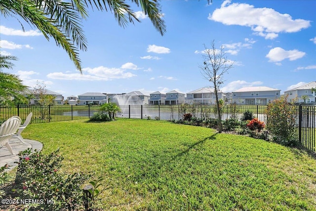 view of yard with a water view