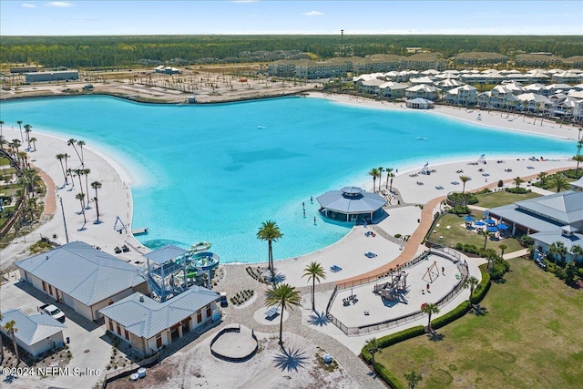 aerial view with a view of the beach and a water view