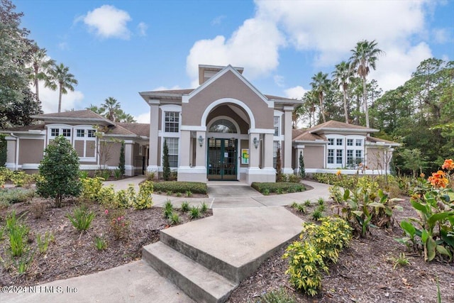 view of front facade featuring french doors