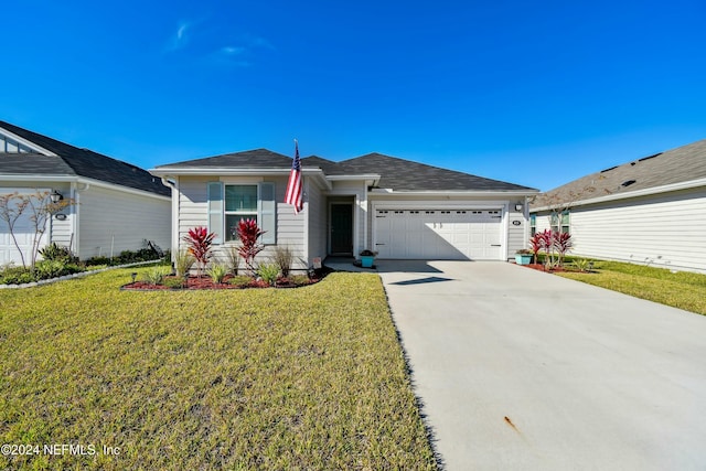 ranch-style house with a front yard and a garage