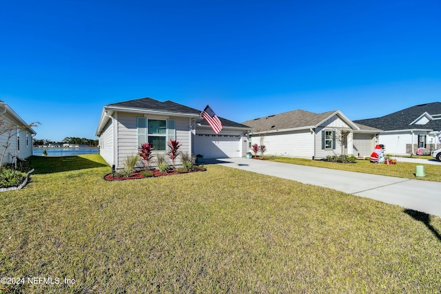 ranch-style home featuring a garage and a front lawn