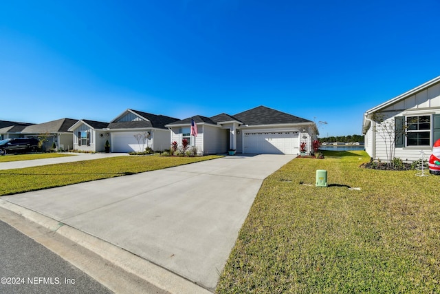 single story home with a front lawn and a garage