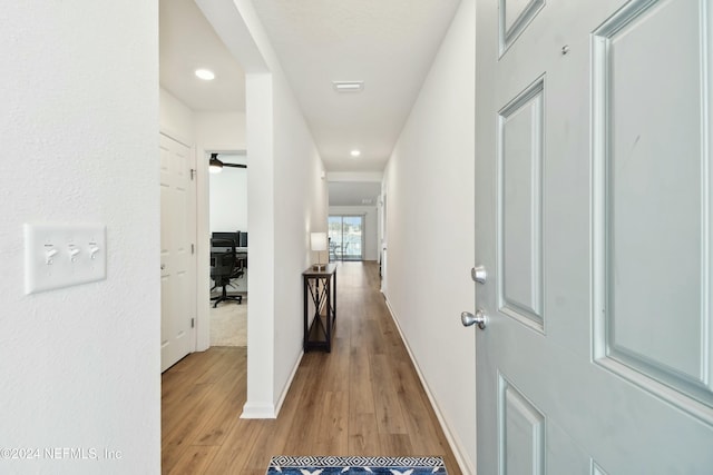 hallway featuring light wood-type flooring