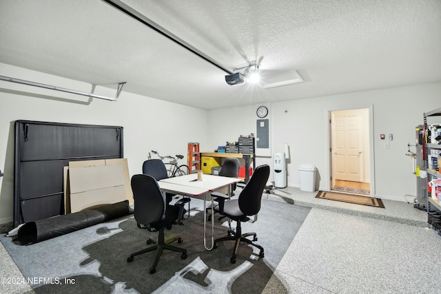 carpeted home office with a textured ceiling and electric panel