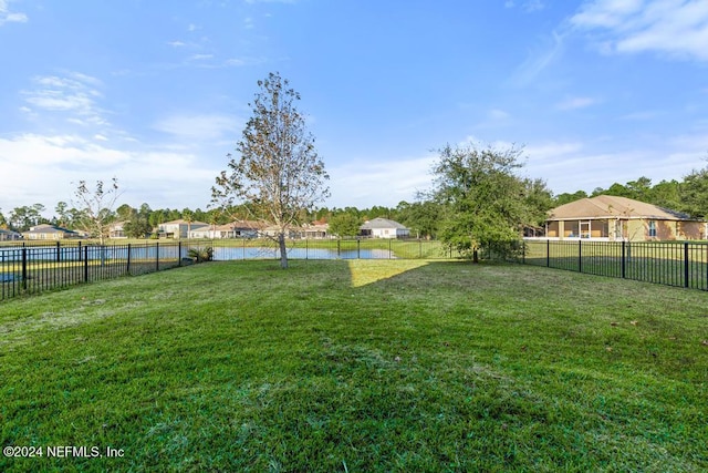 view of yard featuring a water view