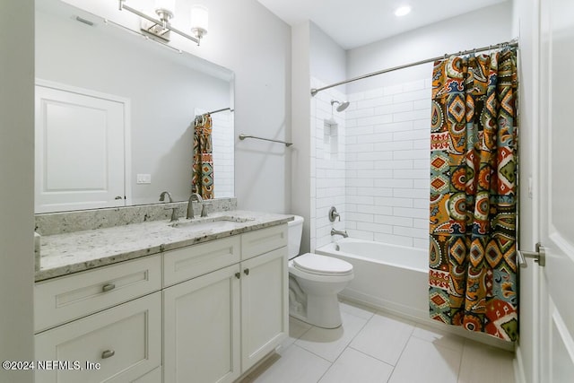 full bathroom featuring tile patterned floors, vanity, toilet, and shower / tub combo with curtain