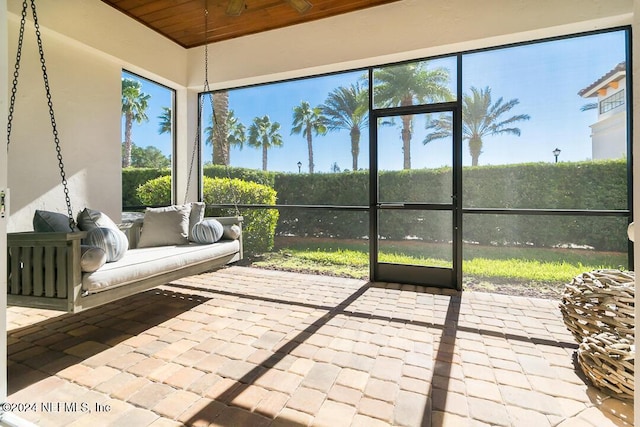 sunroom / solarium with wood ceiling