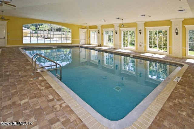 view of pool featuring ceiling fan