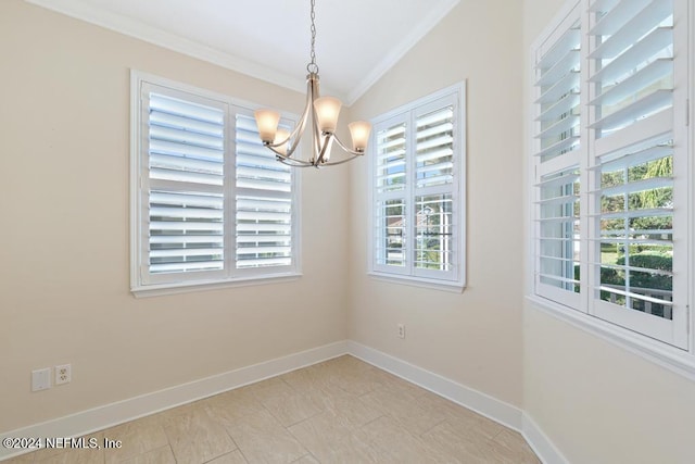 unfurnished dining area featuring a notable chandelier, light tile patterned floors, vaulted ceiling, and ornamental molding