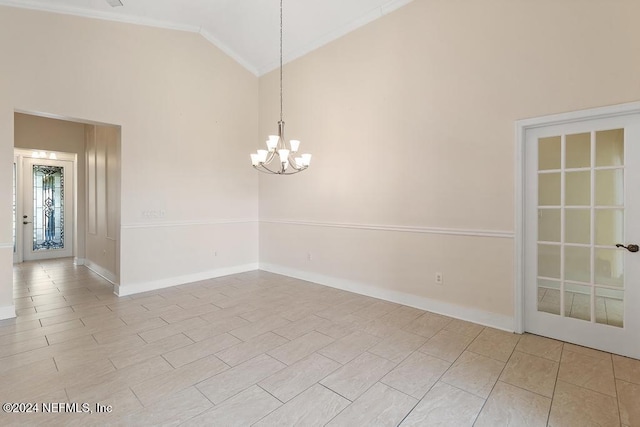 unfurnished room with crown molding, high vaulted ceiling, and a notable chandelier