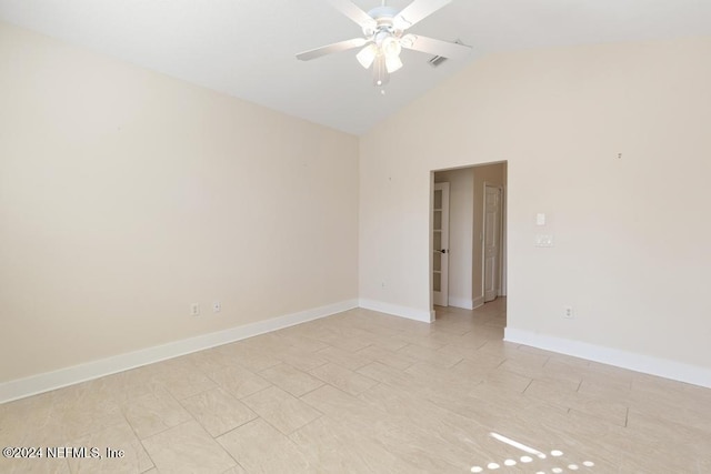 empty room featuring high vaulted ceiling and ceiling fan