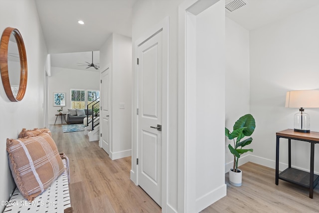 corridor featuring light hardwood / wood-style flooring