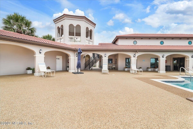 rear view of property with a patio