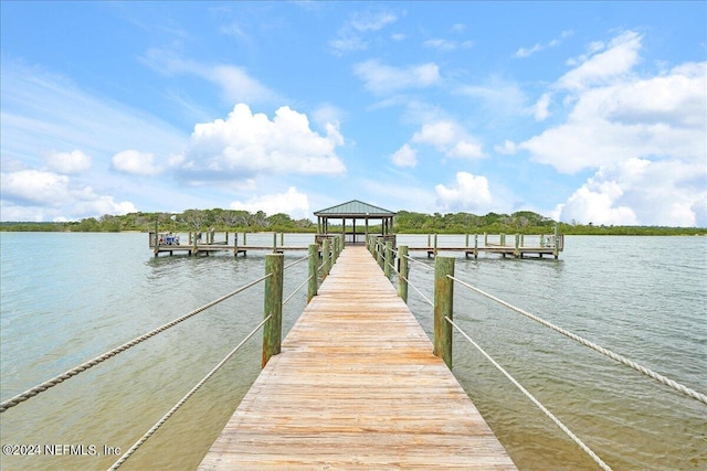 dock area featuring a gazebo and a water view