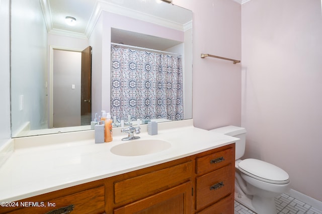 bathroom featuring tile patterned flooring, vanity, toilet, and ornamental molding