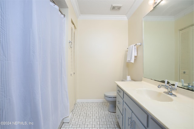 bathroom featuring tile patterned floors, toilet, vanity, and ornamental molding