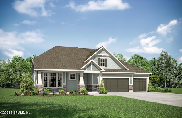 craftsman house featuring a garage and a front lawn