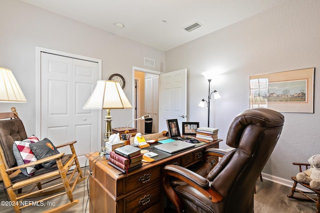 office space featuring dark wood-type flooring