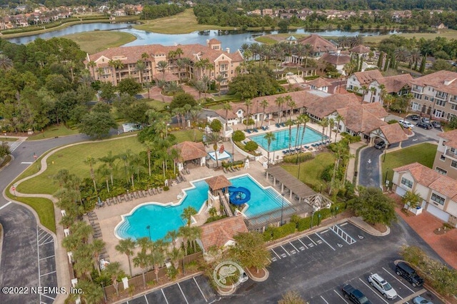 bird's eye view with a water view