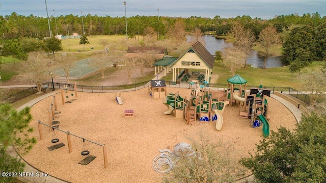 view of jungle gym featuring a water view