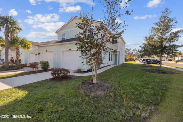 view of home's exterior featuring a lawn and a garage