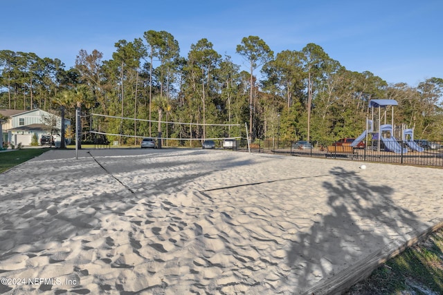 view of home's community with volleyball court and a playground