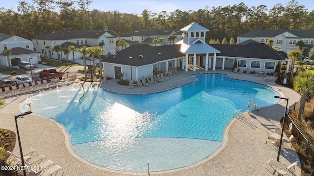 view of pool featuring a patio area