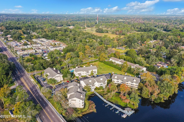 drone / aerial view with a water view