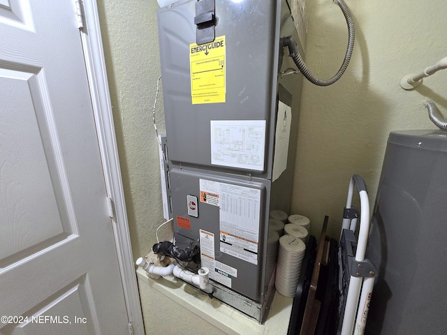 utilities with heating unit and water heater