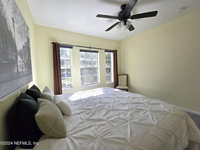 bedroom featuring ceiling fan