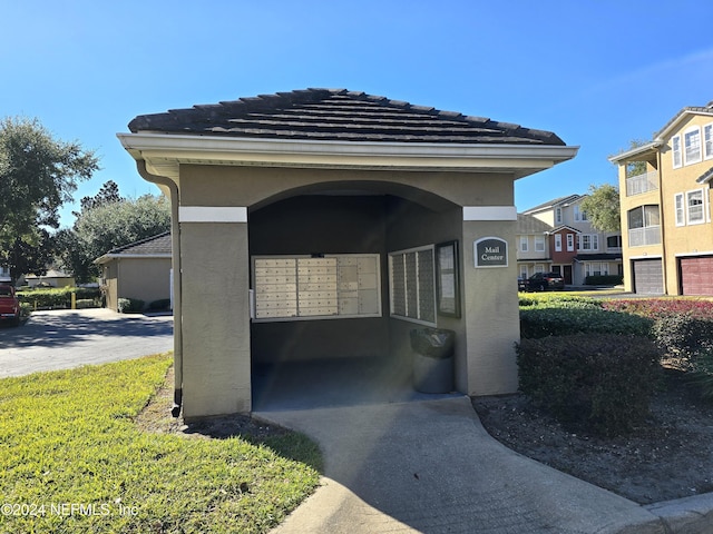 exterior space featuring a mail area