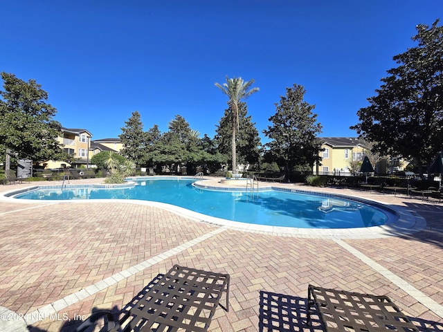 view of pool with a patio