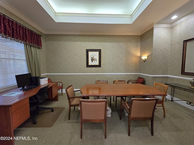 carpeted dining space featuring ornamental molding