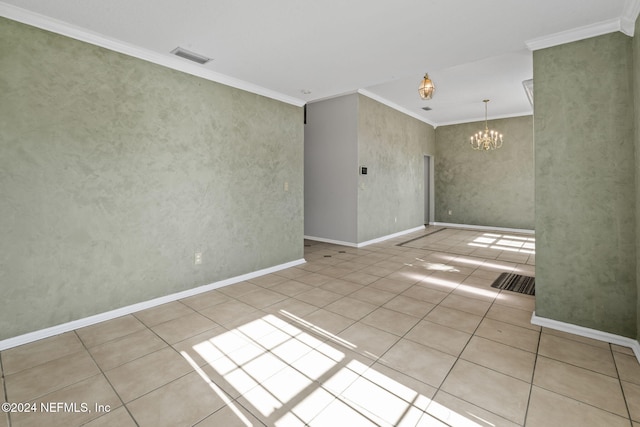 unfurnished room with light tile patterned flooring, a chandelier, and ornamental molding