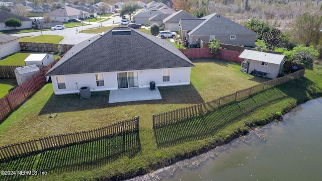 aerial view featuring a water view