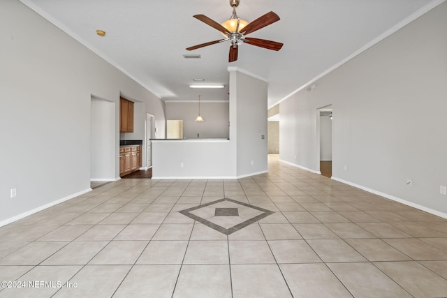 unfurnished living room with ceiling fan, ornamental molding, and light tile patterned flooring