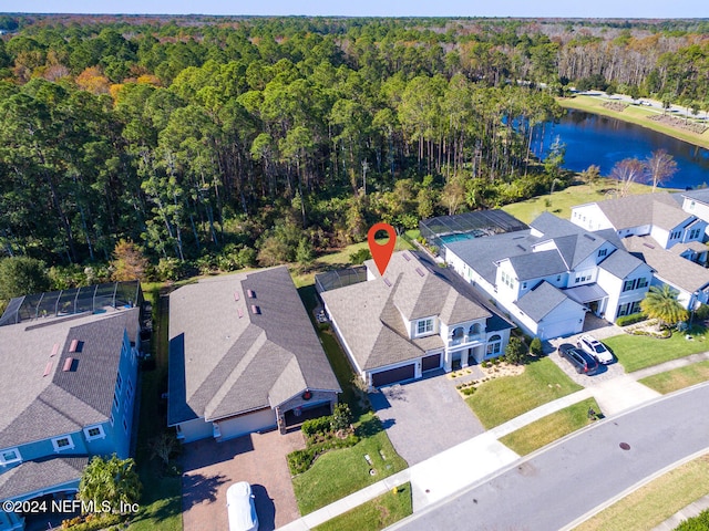 birds eye view of property featuring a water view