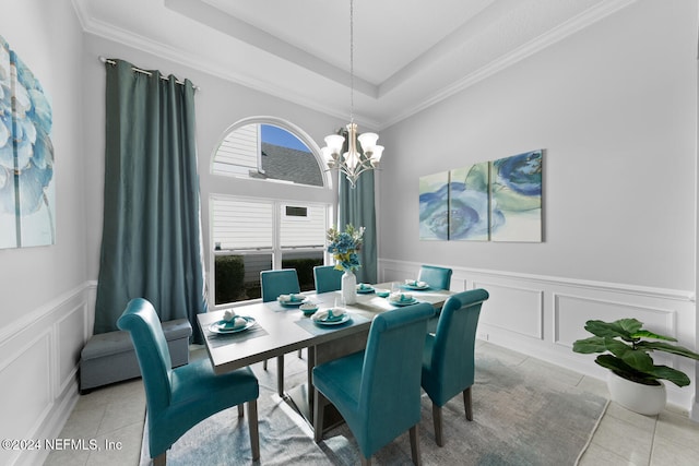 tiled dining space with ornamental molding and a notable chandelier