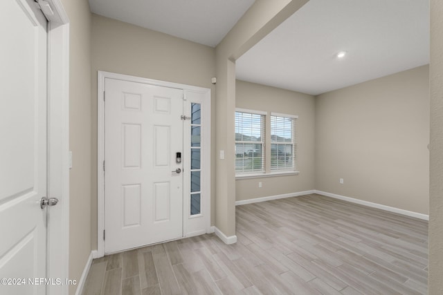 entryway with light hardwood / wood-style flooring