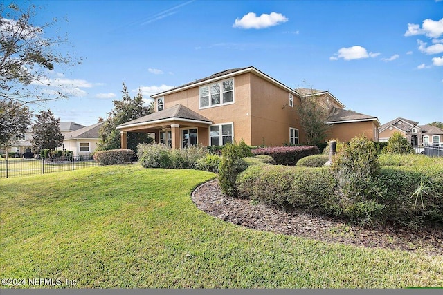 view of front property with a front yard