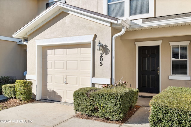 entrance to property with a garage