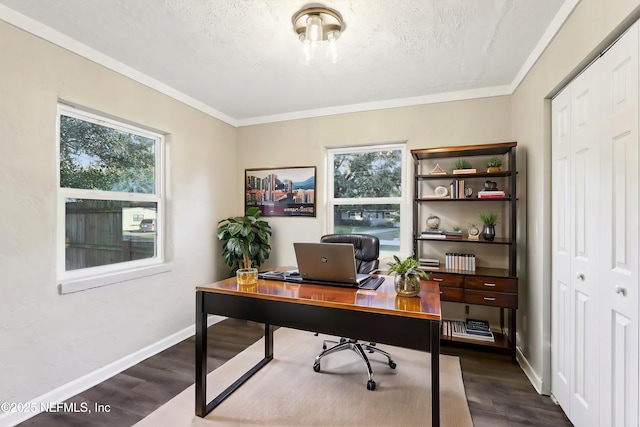 office with plenty of natural light, dark wood-type flooring, and ornamental molding