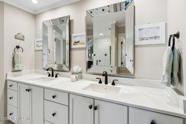 bathroom featuring vanity and ornamental molding