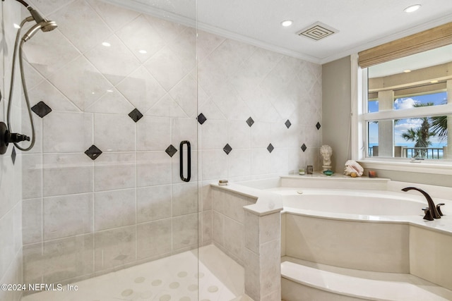 bathroom featuring crown molding and independent shower and bath