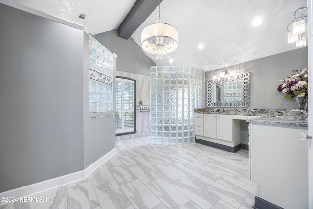 bathroom featuring vanity, lofted ceiling with beams, and a notable chandelier